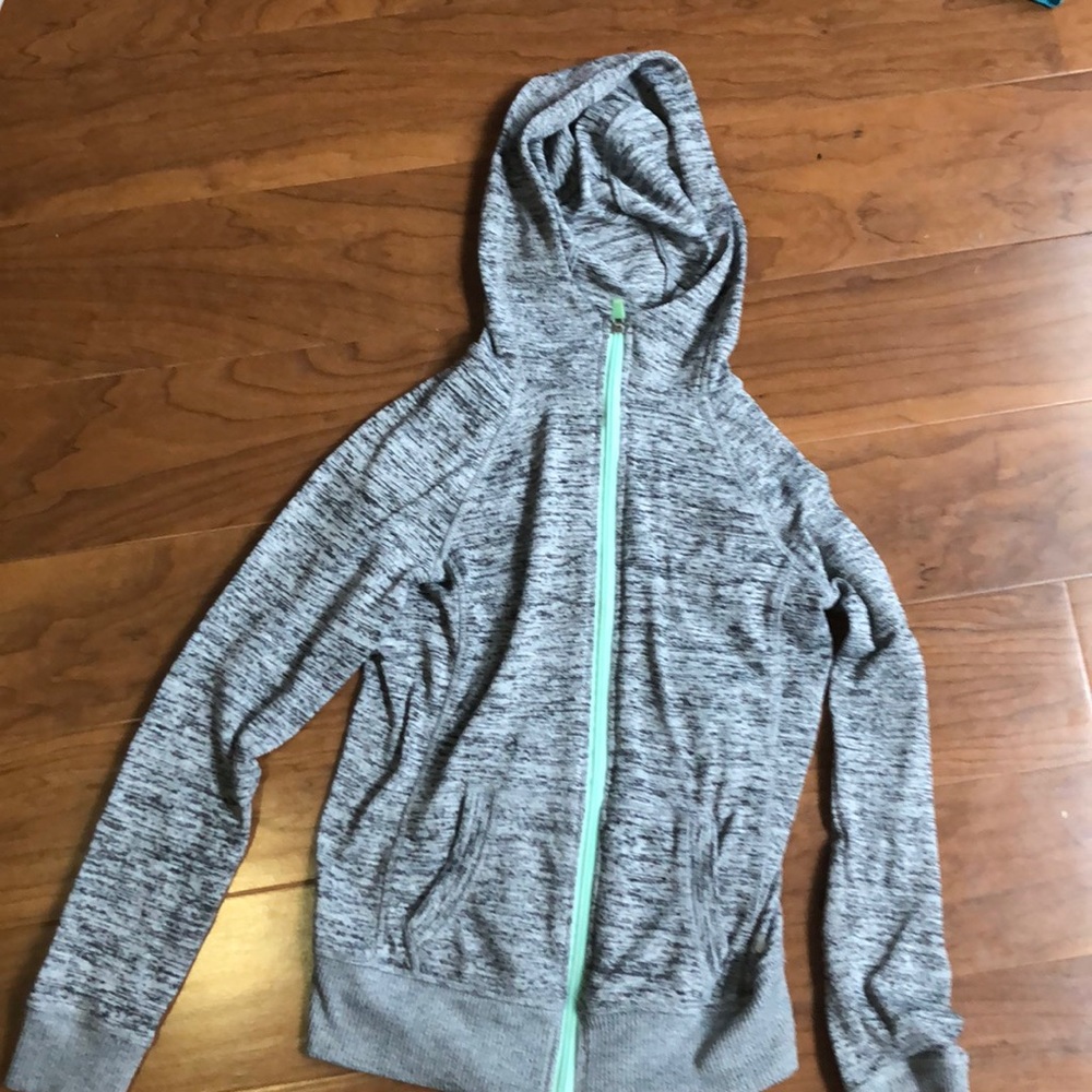 gray hoodie with mint green zippers